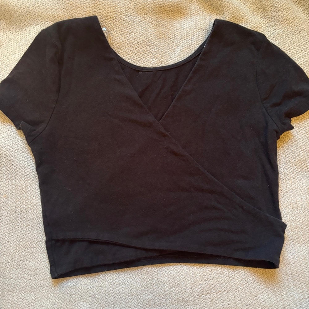 Black crossover baby tee